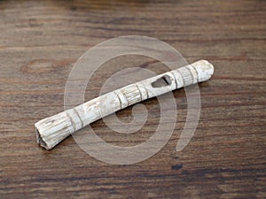 Carved bone whistle