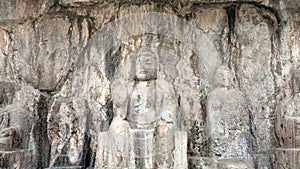 Carved Buddha figure in Longmen Grottoes