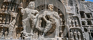 Carved Buddha images at Longmen Caves, Dragon Gate Grottoes