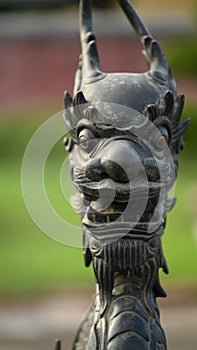 Dragon in the Forbidden City of Hue, detail of head of Dragon photo