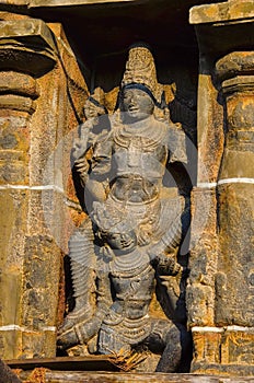 Carved dancing idols on the Gopuram of Nataraja Temple, Chidambaram, Tamil Nadu, India.