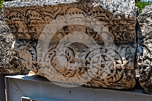 Carved decorative lintel at the ruins of Capernaum in Israel