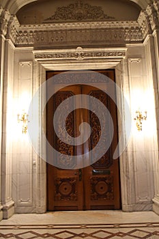 Carved door in Palatul Parlamentului Palace of the Parliament, Bucharest photo