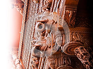 Carved elephant wood architecture detail