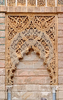 Carved false door in the Royal Alcazar palace in Seville, Spain