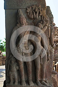 Carved figure of charming mithunas on the pillars of northern mukha mandapa, Virupaksha temple, Pattadakal temple complex, Pattada