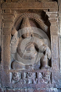 Carved figure of Sankhanidhi, a semi divine being, left panel, Eastern entrance, Virupaksha Temple