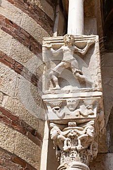Carved figure at the south entrance to the Duomo, Cattedrale Santa Maria Matricolare, Verona, Italy