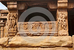 Carved figures and floral patterns on the decorated sober and square pillars of the sabha-mandapa of Lad Khan temple, Aihole, Baga