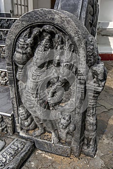 A carved guard stone stands at the Nagadipa Vihara on Nainativu Island in Sri Lanka