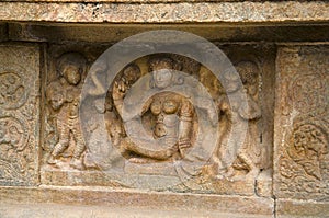 Carved idol on the inner wall of Airavatesvara Temple, Darasuram, near Kumbakonam, Tamil Nadu, India.