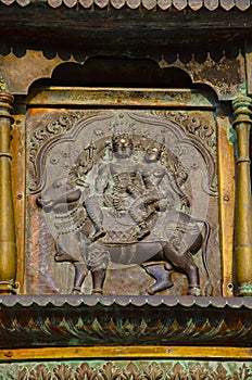 Carved idol on the inner wall of the Brihadishvara Temple, Thanjavur, Tamil Nadu, India.