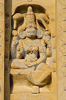 Carved idol on the outer wall of the kanchi Kailasanathar temple, Kanchipuram, Tamil Nadu, India.