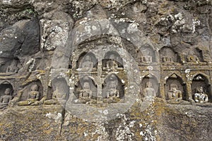Carved idols of Digambar Jain Tirthankaras on the rock of Mangi Tungi, Nashik photo