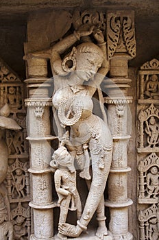 Carved idols on the inner wall of Rani ki vav, an intricately constructed stepwell on the banks of Saraswati River. Patan in