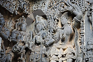 Carved idols on the outer wall of Hoysaleswara temple, is a 12th-century Hindu temple dedicated to lord Shiva, Halebeedu