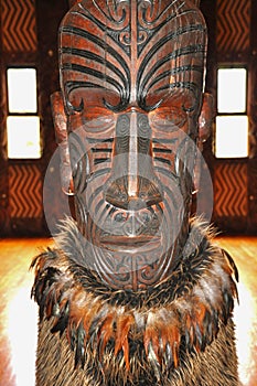 Carved interior of a Maori meeting house.