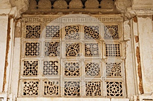 Carved jali on the outer wall of Sarkhej Roza, mosque and tomb complex. Makarba, Ahmedabad, Gujarat, India