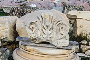 Carved marble chunk from antiquity carefully stacked by archeologists near the Parthenon on the Athens Accropolis