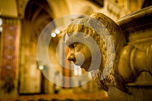 Carved marble head on side of cathedral altar