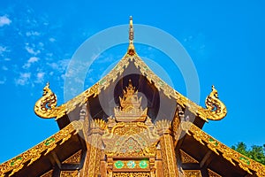 Pyathat multi-tired roof of Wat Inthakhin Sadue Muang, Chiang Mai, Thailand photo