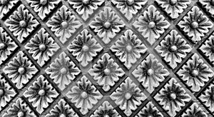 Carved Monotone Vintage Style Floral Pattern in Rectangle Shape on Wooden Background Texture for Furniture Material or used as Bea