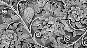 Carved Monotone Vintage Style Floral Pattern on Wooden Background Texture for Furniture Material or used as Bea