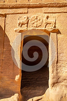 Carved ornamented entrance to the tomb at Jabal al banat complex, Hegra, Al Ula, Saudi Arabia