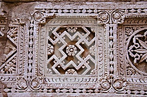 Carved Patola Double Ikat pattern on the inner wall of Rani ki vav, an intricately constructed stepwell on the banks of Saraswat