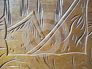 Carved pattern of a landscape on wood timber nicely done some details