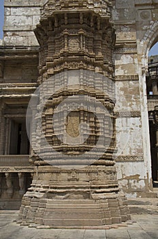 Carved pillar of outer wall of Kevada Masjid , has minarets, globe like domes and narrow stairs, Built during the time of Mahmud