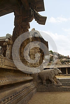 Carved pillars of at the entrance of the maha-mandapa, Achyuta Raya temple, Hampi, Karnataka. Sacred Center. View from the east photo