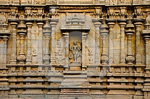 Carved pillars and idols on the outer wall of the Brihadishvara Temple, Thanjavur, Tamil Nadu, India