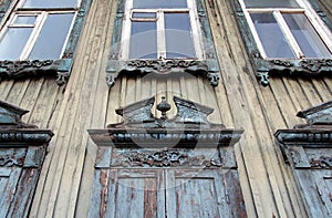 Carved platband on an old wooden house. Krasnoyarsk