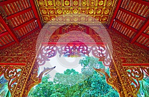 The carved porch decors of Wat Phrao Wat Lum, Wat Phra That Lampang Luang, Lampang, Thailand