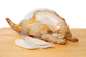 Carved roast chicken