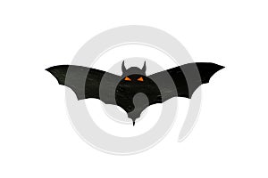 Carved scary figurine of bat on a white background, the concept of the holiday Halloween