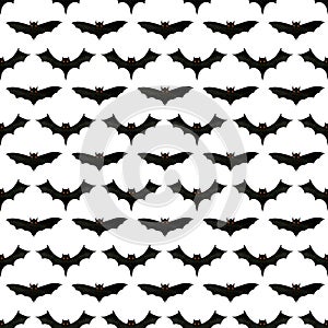 Carved scary figurines of bats on a white background seamless pattern, the concept of the holiday Halloween