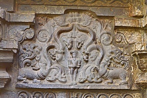 Carved sculpture on the wall of Kopeshwar Temple, Khidrapur, Maharashtra photo