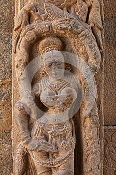 Carved scuplture of woman on entrance gate of Someshwara Temple, Kolar, Karnataka