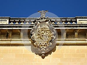 The Carved Shield on a building in Mdina historical center, Mdina, MALTA