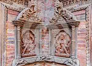 Carved statues on Mul Chowk courtyard wall, Hanuman Dhoka Royal Palace, Patan Durbar Square, Lalitpur, Nepal