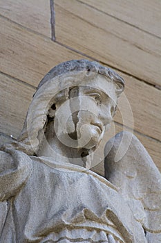 Carved stone angel face