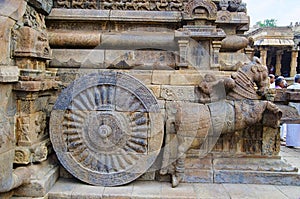 Carved stone chariot on the outer wall of Airavatesvara Temple, Darasuram, near Kumbakonam, Tamil Nadu, India.