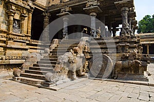Carved stone chariot on the outer wall of Airavatesvara Temple, Darasuram, near Kumbakonam, Tamil Nadu, India.