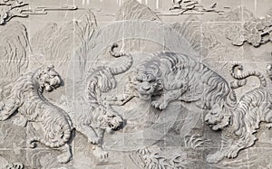 The carved stone of Chinese temple and Tiger statue