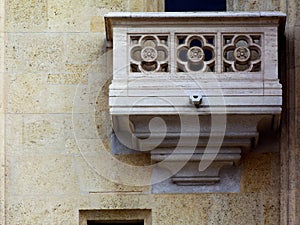 stone balustrade and balcony in frontal elevation carved stone latticework photo