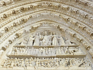 Carved stone Lintel on a church door photo