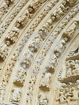 Carved stone Lintel on a church door photo