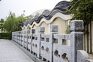 Carved stone pillars and wall